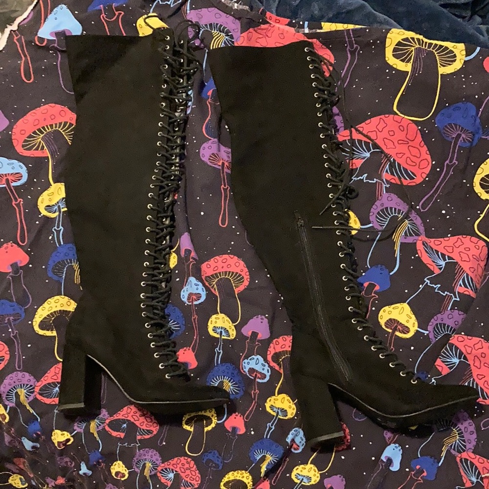 Used thigh high boots